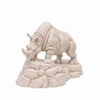Charging Rhino statue Warm Beige on white background
