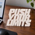 Push Your Limits desk letters in Ivory on an office desk