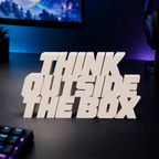 Think Outside the Box desk letters in Ivory on a gaming desk