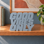 Good Vibes Only desk letters – Light Gray on the ledge