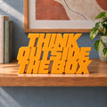 Think Outside the Box desk letters – Orange on the ledge