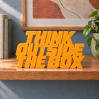 Think Outside the Box desk letters – Orange on the ledge