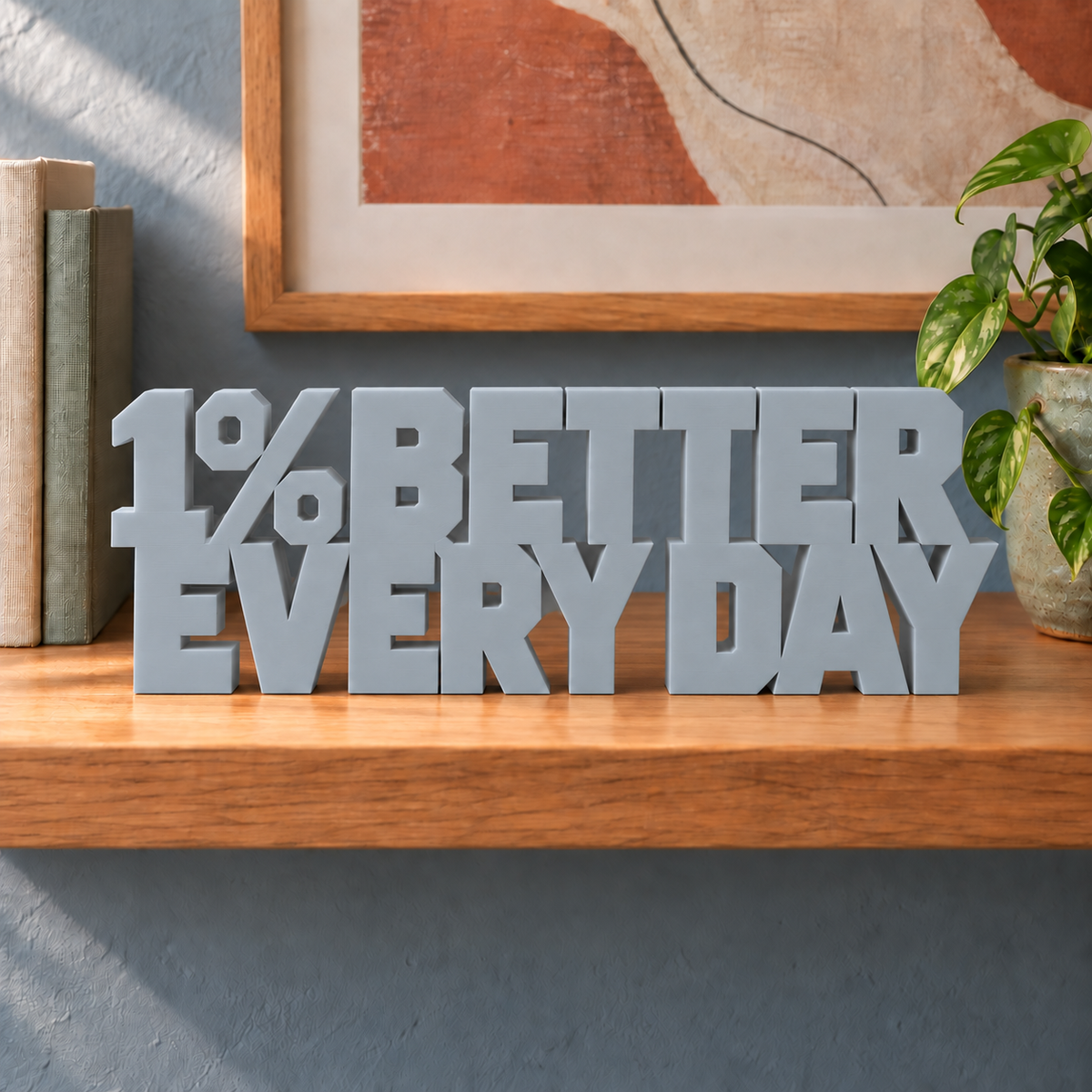 1% Better Every Day desk letters – Light Gray on the ledge