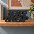 Never Give Up desk letters – Black on the ledge