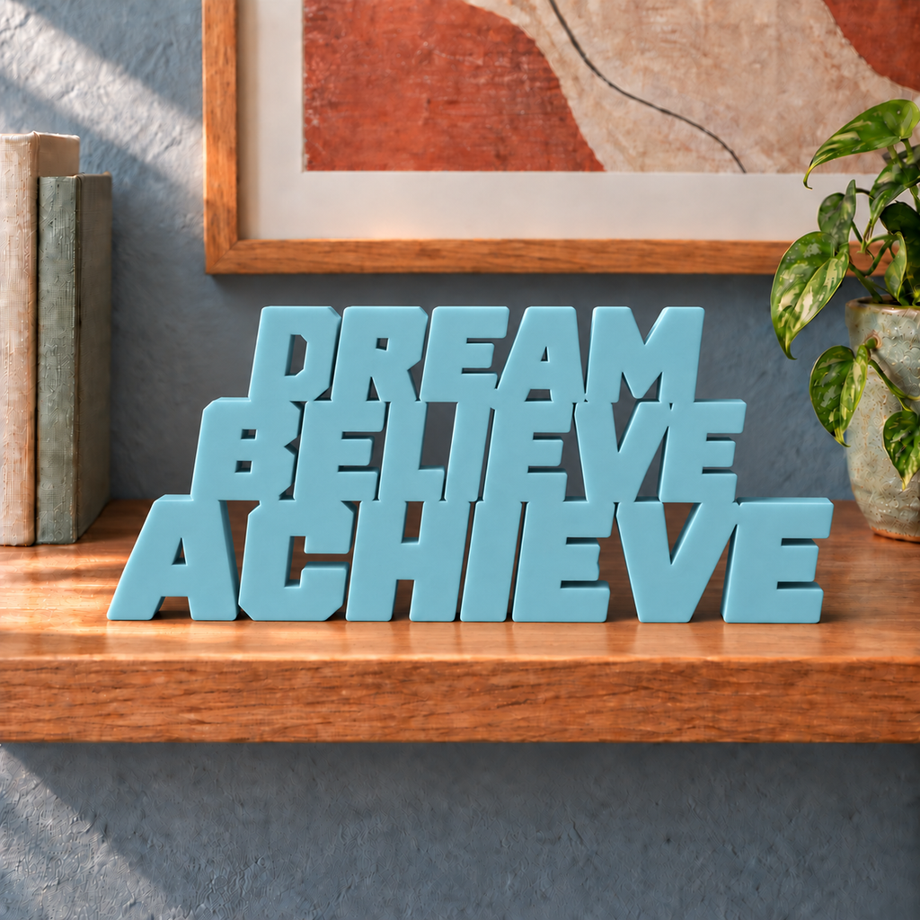 Dream Believe Achieve desk letters – Teal Blue on the ledge