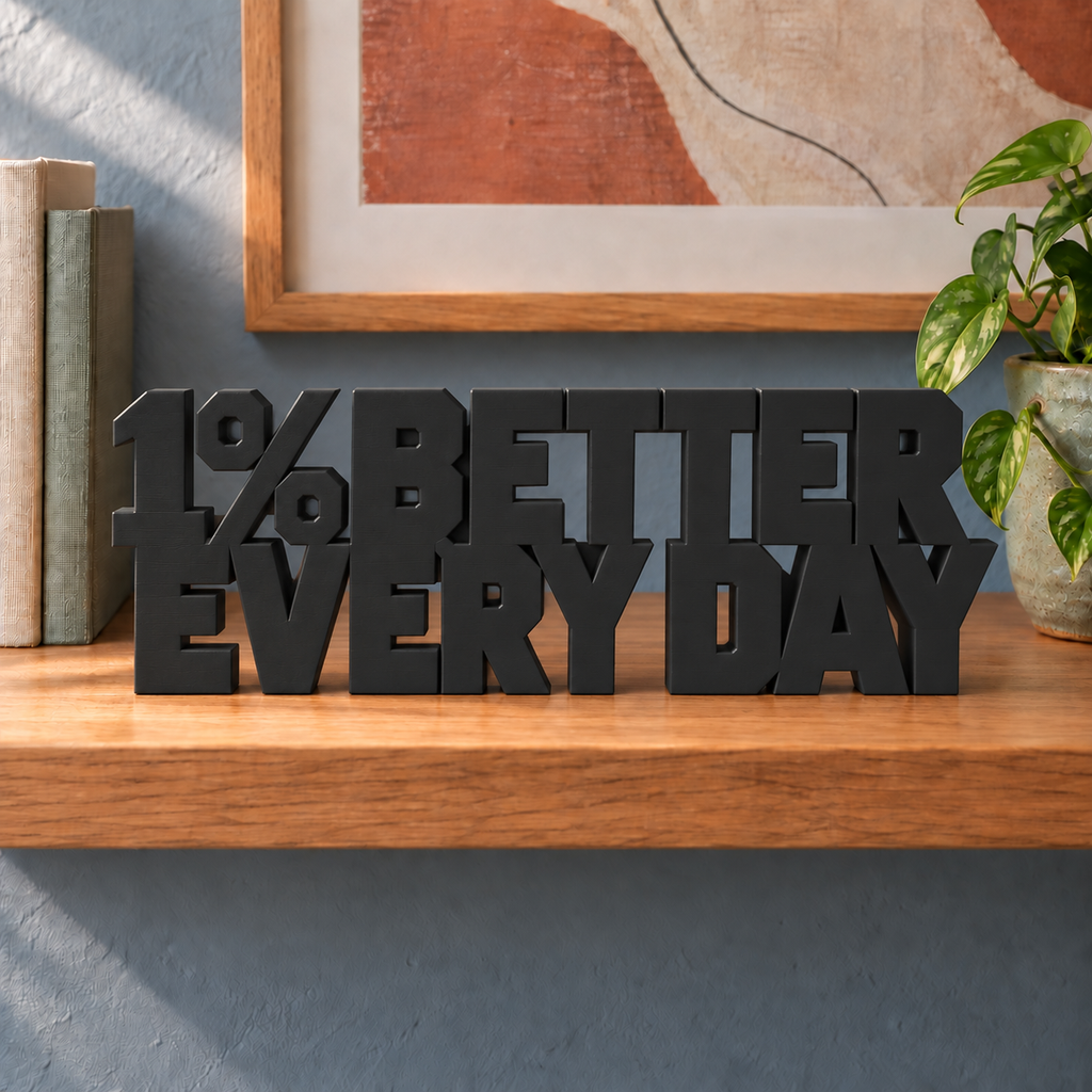 1% Better Every Day desk letters – Black on the ledge
