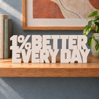 1% Better Every Day desk letters – Ivory on the ledge