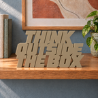 Think Outside the Box desk letters – Sandstorm on the ledge