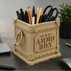 CONQR Lock & Load ammo box pen stand holding pens and scissors on a home office desk