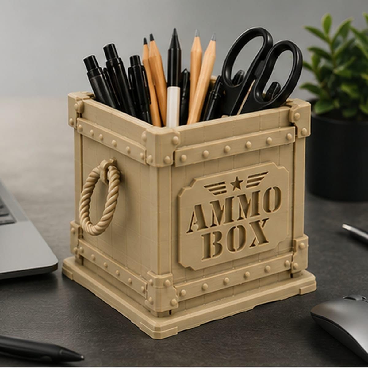 CONQR Lock & Load ammo box pen stand holding pens and scissors on a home office desk