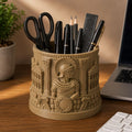 CONQR The Legion Roman warrior pen stand holding pens, scissors and ruler on a wooden desk