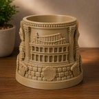 CONQR Roman pen stand reverse face with sculpted Colosseum above a stone wall