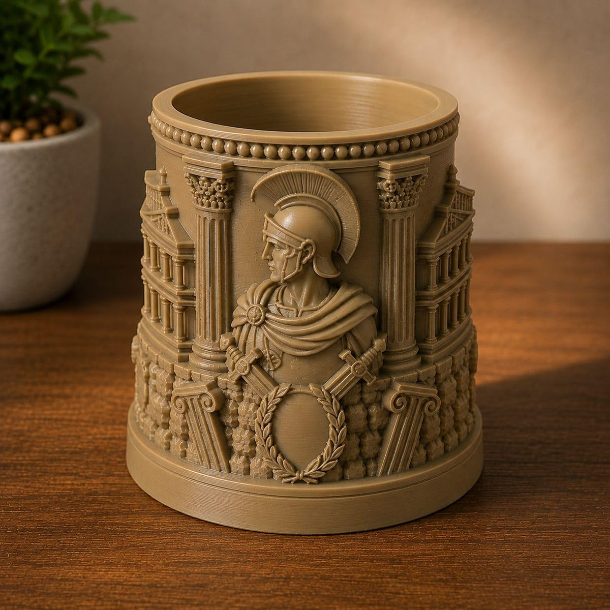 Angled view of CONQR Roman warrior pen stand showing laurel wreath and fluted columns