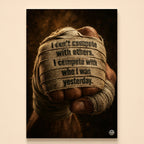 Clenched fist in worn boxing wraps printed with I compete with who I was yesterday