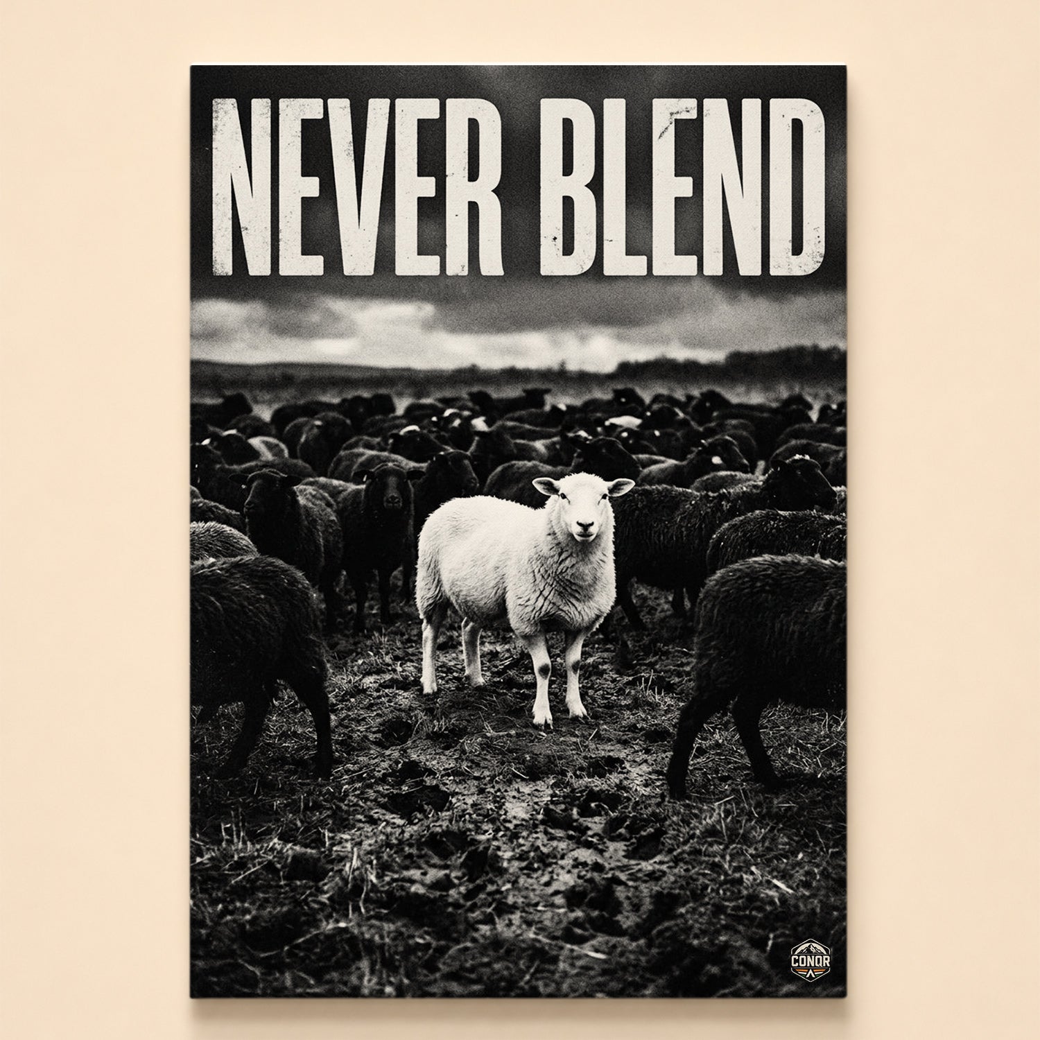 One white sheep facing forward in a herd of black sheep under the words Never Blend