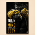 High-contrast fighter with gold hand wraps extending a fist – train your mind before you train your body