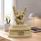 Born Loud XL on a bright desk, shown to scale beside a pen cup and lamp