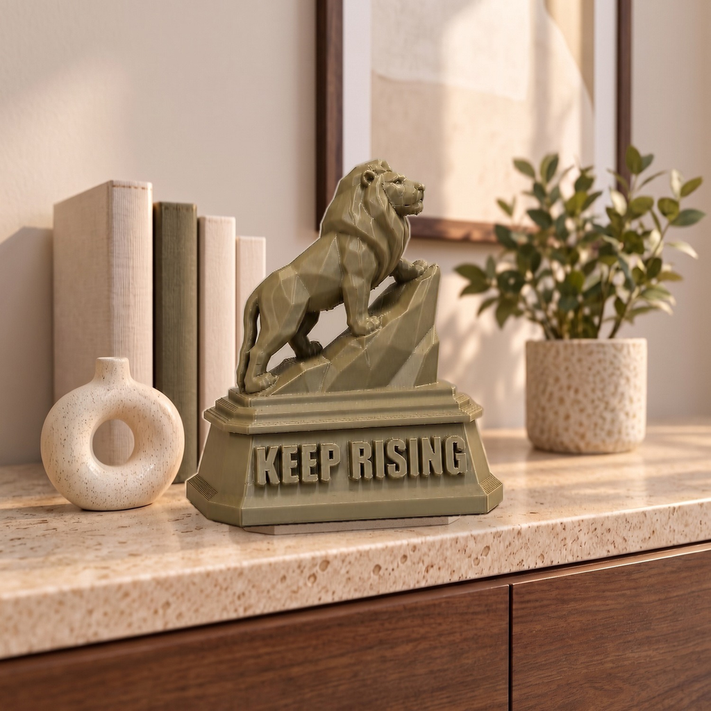 The Lion XL on a marble-topped shelf, shown to scale beside books, a vase and a plant
