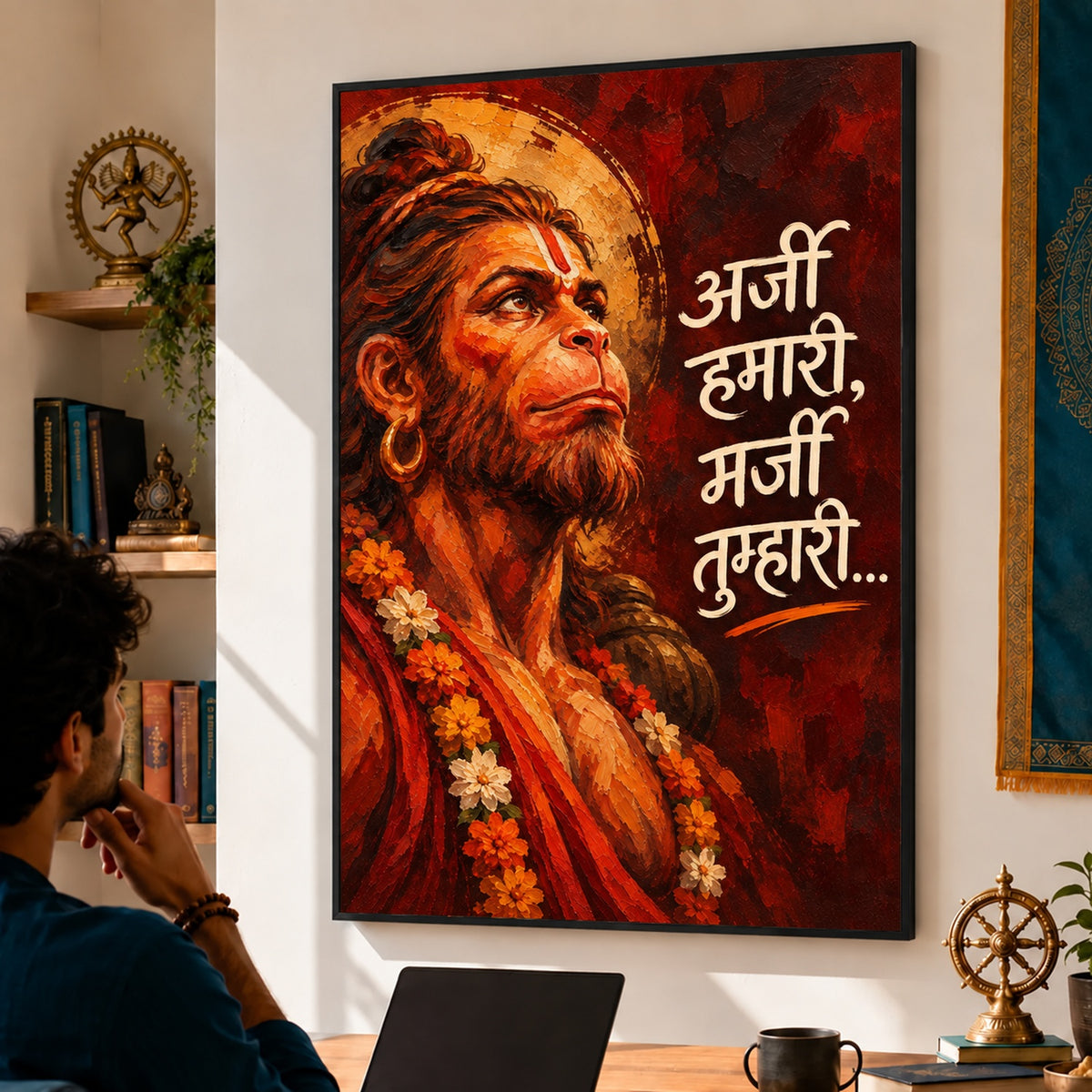 24x36 Hanuman Ji wall art in a black box frame displayed in a sunlit study