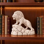 Unstoppable roaring lion desk statue in Warm Beige, small 18.5 cm, on a library bookshelf